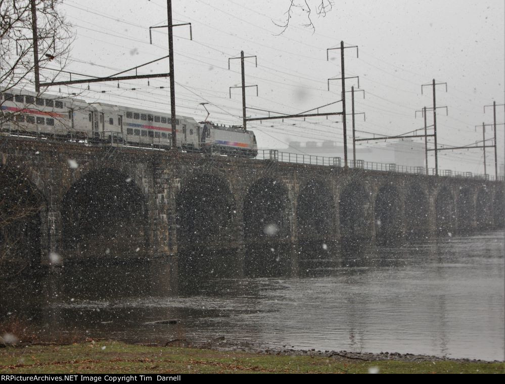 NJT 4607 heads toward Trenton in heavy flurries.